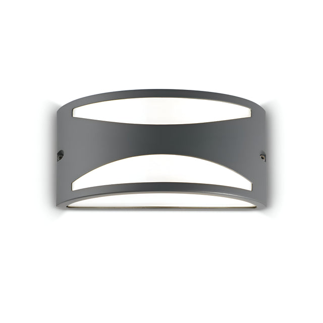 Introducing the Venus-2 Outdoor Wall Light in grey: a contemporary wall sconce crafted from die-cast aluminium with a sleek curved design. It features two rectangular cutouts that elegantly allow light to pass through while providing modern style and an IP44 rating for durability.