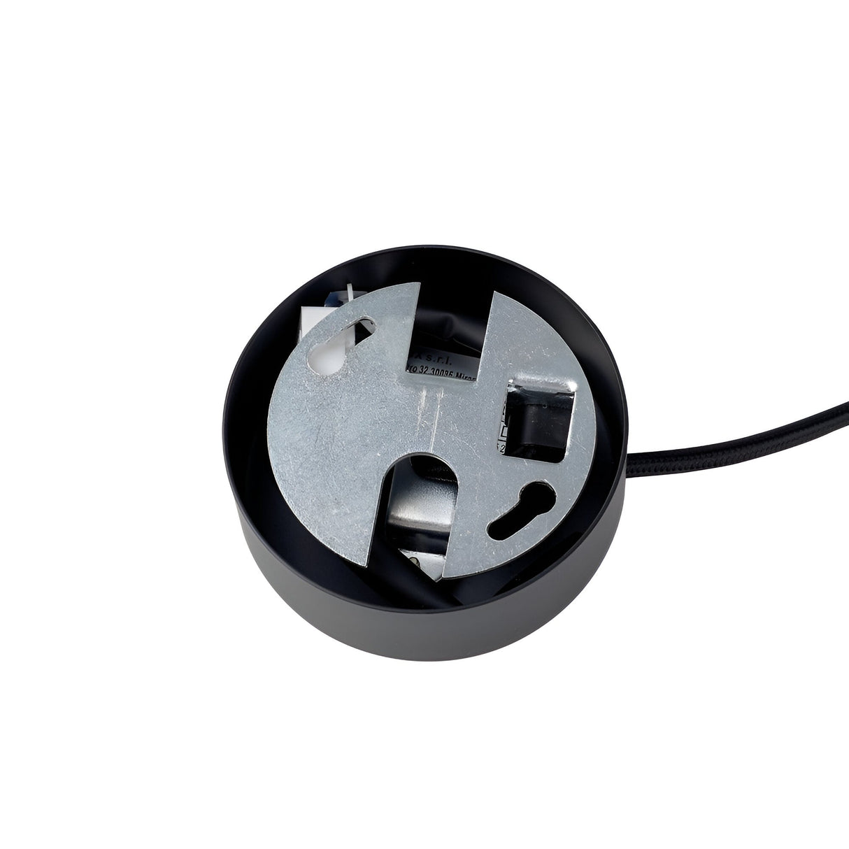 Close-up of the Blaze 1 Light Pendant in black, showcasing its circular design with visible metallic internal components featuring various shapes and openings. A cable extends from the side. The modern lighting design exudes a technical and industrial vibe.