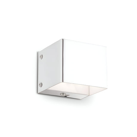 The Vividara Wall Light - White is a sleek, modern fixture with a square design that features clean lines and a minimalist lighting style, perfect for mounting on a plain white wall. Its glossy material is elegantly secured with small screws, exuding contemporary elegance.
