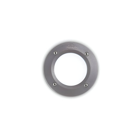 Set against a white backdrop, the Polar Recessed Round Outdoor Light in grey showcases a round metallic design with a white central panel. Its industrial style includes four visible screws on the circular rim, and it's suitable for outdoor use due to its UV-resistant materials.