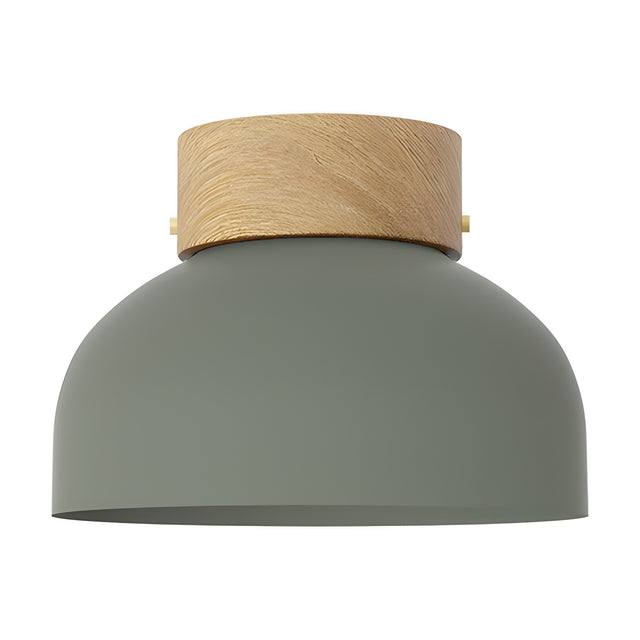 Reiko Dome Flush Ceiling Light with a green aluminium dome shade and natural ash wood base, shown on a plain white background.