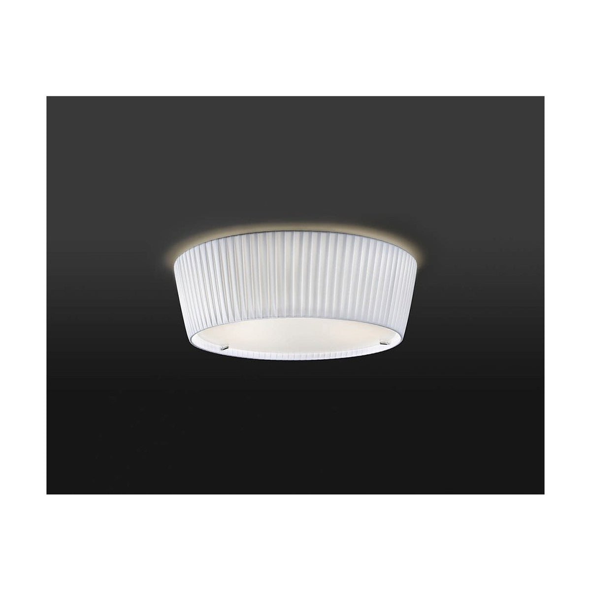 Plafonet 43 Ribbon Drum ceiling light with a white translucent pleated ribbon shade and frosted glass diffuser, shown glowing against a dark background.
