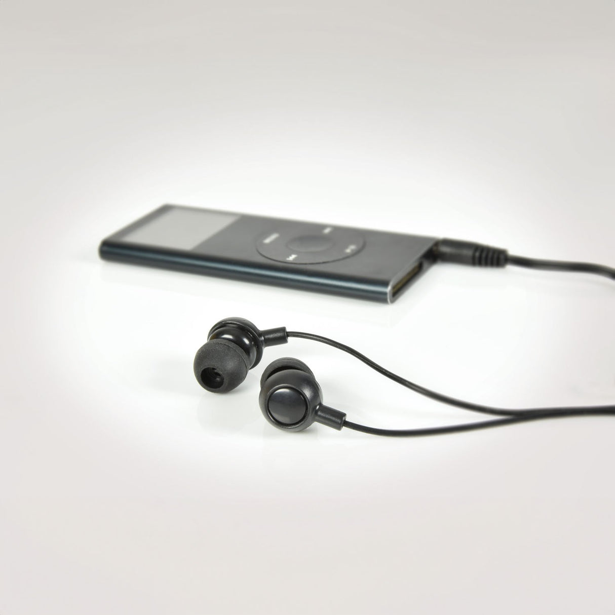 AV:Link EM9B round mini in-ear earphones in black with 3.5mm jack connected to a slim MP3 player on a white background.