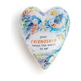 Wooden heart-shaped box with domed lid, hand-painted with songbirds and florals in blue, orange and green, reading your friendship means the world to me, on white background.
