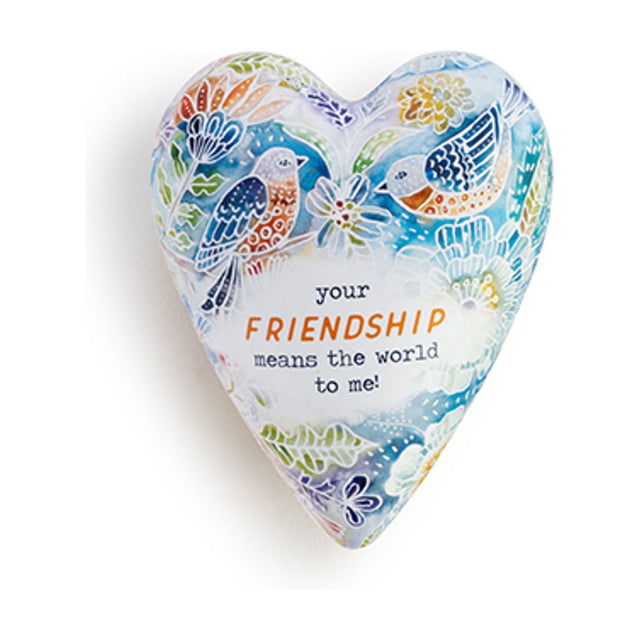 Wooden heart-shaped box with domed lid, hand-painted with songbirds and florals in blue, orange and green, reading your friendship means the world to me, on white background.