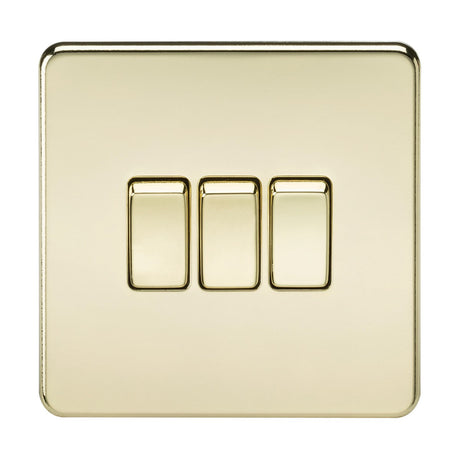 The 10AX 3 Gang 2-Way Switch in a polished brass finish boasts a shiny, smooth appearance and features a sleek, screwless design.