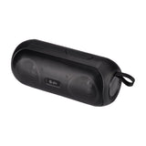 QTX PartyPod portable Bluetooth speaker in matte black with mesh grille, top control buttons, USB port cover and carry strap, shown on a white background.