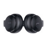 AV:Link Isolate SE noise cancelling Bluetooth headphones in black, shown from above with earcups side by side, revealing controls, USB-C port and 3.5mm jack.