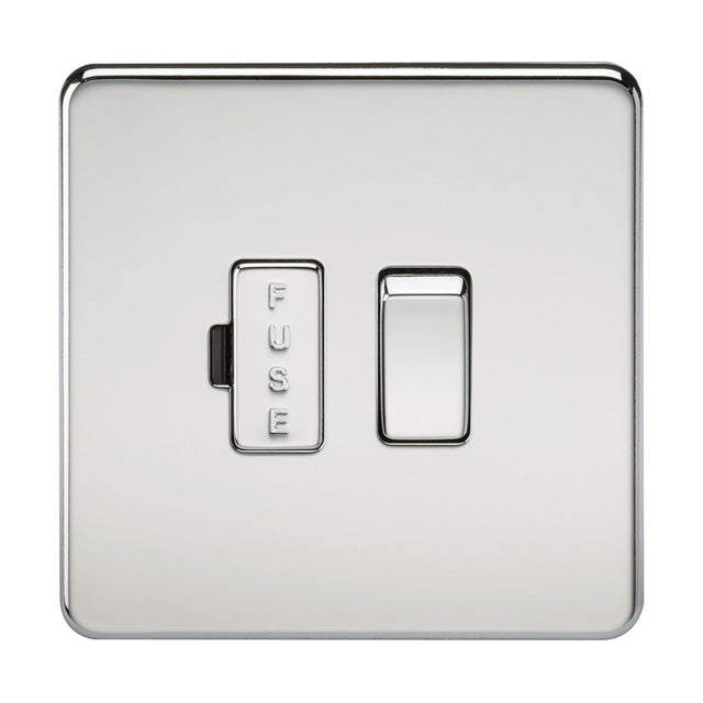 The 13A Switched Fused Spur Unit in polished chrome boasts a sleek, screwless low-profile design. It includes a single rocker switch on the right and a rectangular fuse holder labeled FUSE on the left, offering functionality similar to a fused spur. Its reflective surface enhances elegance in any modern setting.
