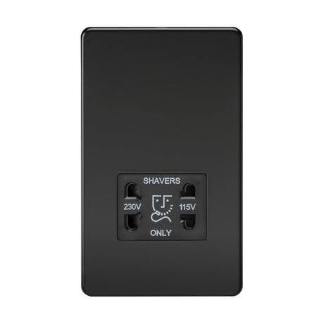 The 115V/Dual Voltage Shaver Socket in matt black features dual outlets labeled 230V and 115V, with a shaver icon between them. Designed for durability, it is crafted from premium steel and has an IP41 rating for added protection.