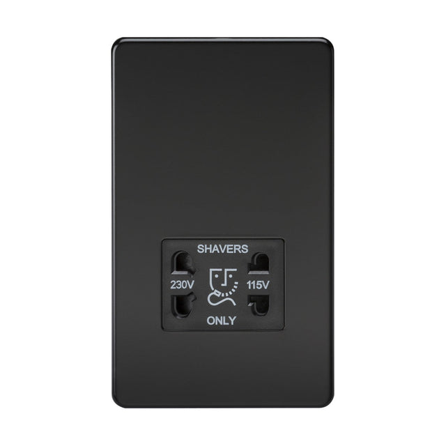 The 115V/Dual Voltage Shaver Socket in matt black features dual outlets labeled 230V and 115V, with a shaver icon between them. Designed for durability, it is crafted from premium steel and has an IP41 rating for added protection.