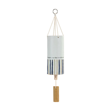 Ceramic wind chime in off white with navy, blue-grey and beige stripes near the base, hung from a metal ring on cord with a wooden rectangular clapper, shown on a plain white background.