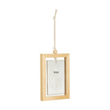 Hope Rainbow Framed Hanging Ceramic Plaque in a light wood frame, with a stone-coloured tile reading "hope" above a raised arched rainbow, hung on a cord against a plain white background.