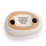 Underside of the Blessed Mum Heart Oval Stone ceramic ornament, showing a speckled tan recess with two drainage holes and a printed care label, set against a white background.