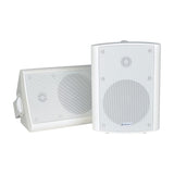 Adastra BC5-W 5.25" white commercial background speakers shown as a pair with steel grilles and ABS enclosures on a plain white background.
