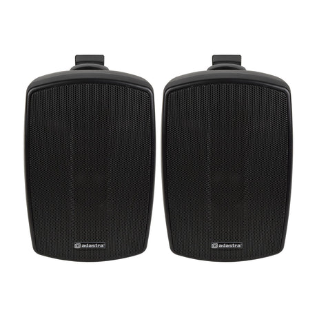 Pair of Adastra BH4-B matt black indoor/outdoor background speakers with mesh grilles and wall mounting brackets, shown on a plain white background.
