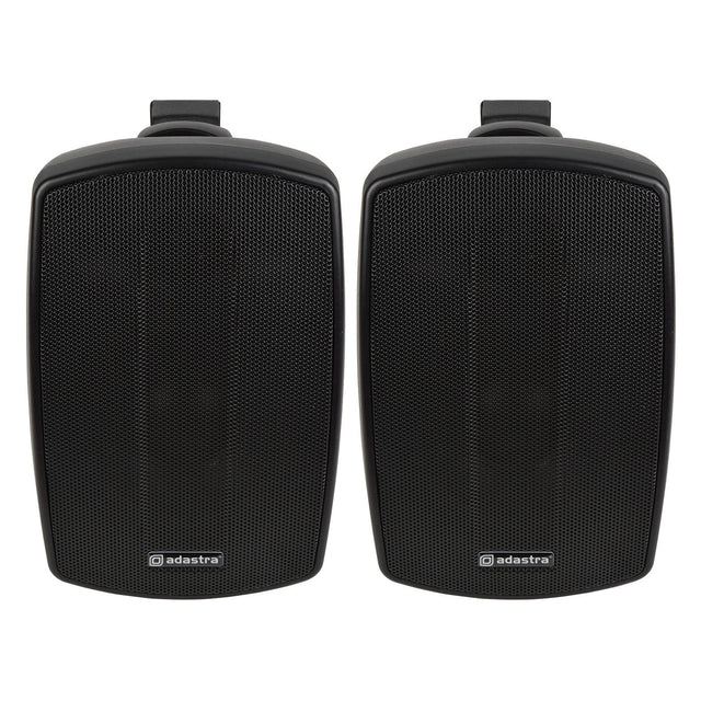 A pair of black Adastra BH4 4" 60W speakers with protective grilles, set against a white background. These IP44-rated weather-resistant speakers are perfect for indoor or outdoor use and come with top brackets for easy wall installation.
