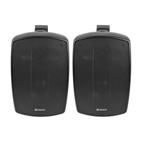 Adastra BH5-B matt black indoor/outdoor background speaker pair with mesh grilles and wall mounting brackets, shown on a plain white background.