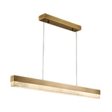Niori Linea 1m linear LED chandelier with slim brushed brass channel, natural alabaster diffuser, and twin suspension cables on a white background.