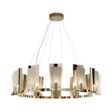 The Aurevon 10 Light Circular Alabaster Chandelier in Soft White & Copper features a modern gold frame with vertical Spanish alabaster and copper panels, elegantly suspended by thin wires and illuminated by small bulbs between the panels.