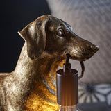Gold resin Bevworth Table Lamp shaped like a dachshund with textured fur detail and a black E27 lamp holder at the mouth.