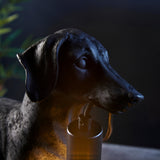 Bevworth Table Lamp in Black, resin dachshund-shaped base with matt black E27 lamp holder, styled against a dark background.