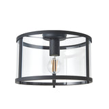 Endon Ellery flush ceiling light in black with a cylindrical glass shade and single E27 filament bulb, shown on a plain white background.