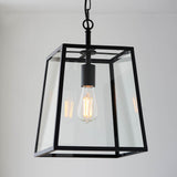 Brenton Lantern Pendant in black, a tapered box-frame ceiling light with clear glass panels and an exposed E27 filament bulb.