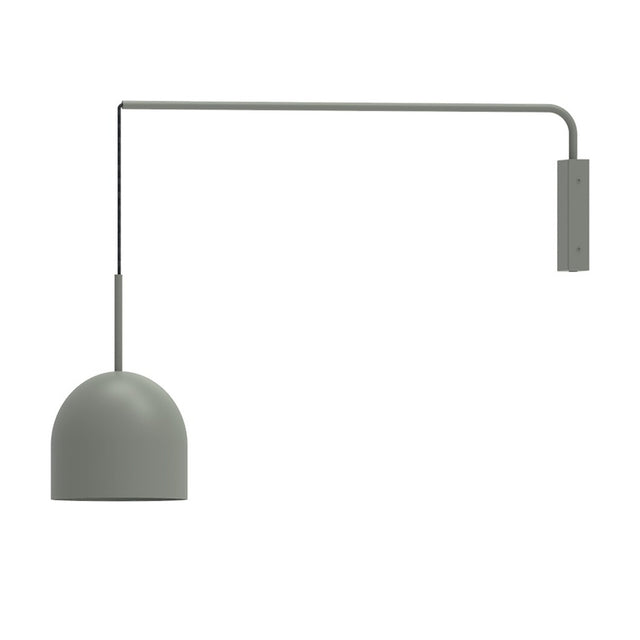 Rio Single Arm Dome Wall Light in green, with a slim iron arm from a wall plate and a textile cable suspending a rounded dome shade, shown on a plain white background.
