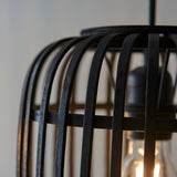 Close-up of Endon Bracken 3 Light Pendant in black, showing the dark-stained bamboo cage framework and warm filament E27 lamp within.