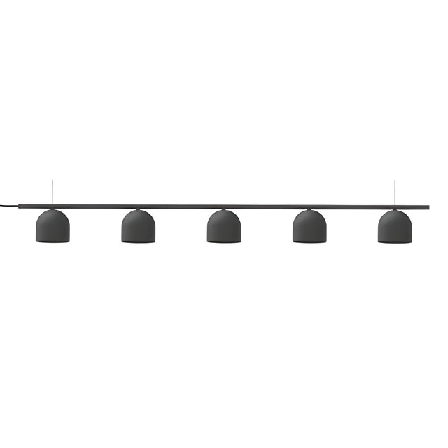 Rio 9 Linear 5 Light Dome Chandelier in matt black iron, featuring a slim horizontal rail with five small dome shades suspended in a row, shown on a plain white background.