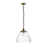 Wentworth Pendant in antique brass with a clear glass dome shade, knurled lampholder, and black chain, shown on a plain white background.