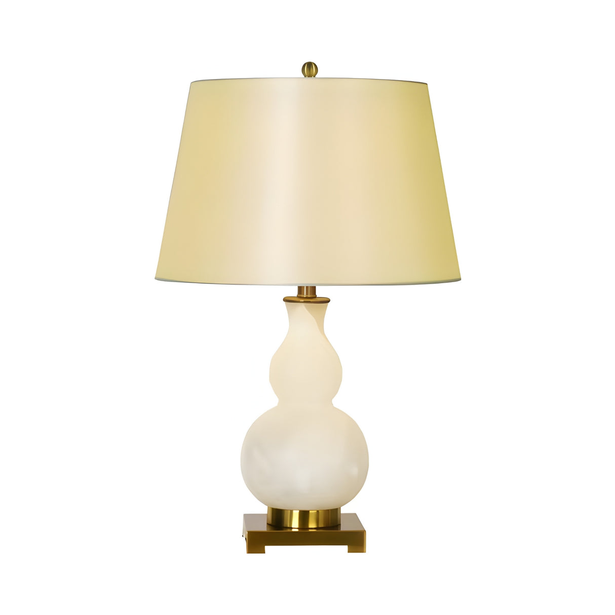 The Lumetra 1 Light Sculpted Alabaster Table Lamp features a curvy soft white base, a large cream shade, and sits on a brass square platform.