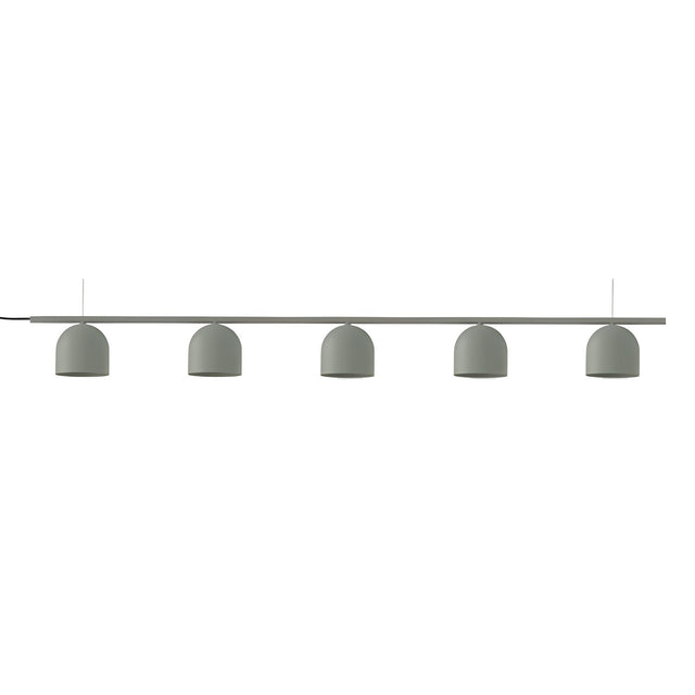 Rio 9 Linear 5 Light Dome Chandelier in green, five small dome shades on a slim iron rail suspended by two thin wires, shown on a plain white background.