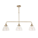 Endon Wentworth 3 light linear stem pendant in antique brass with three clear glass dome shades and exposed filament bulbs on a plain background.