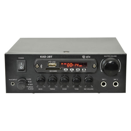 Front view of the QTX KAD-2BT Digital Stereo Amplifier with Bluetooth, featuring a sleek black design. This amplifier includes various controls such as bass, treble, and volume knobs, along with two microphone inputs, an AUX input, USB and SD card slots. It also has a digital display for track information.