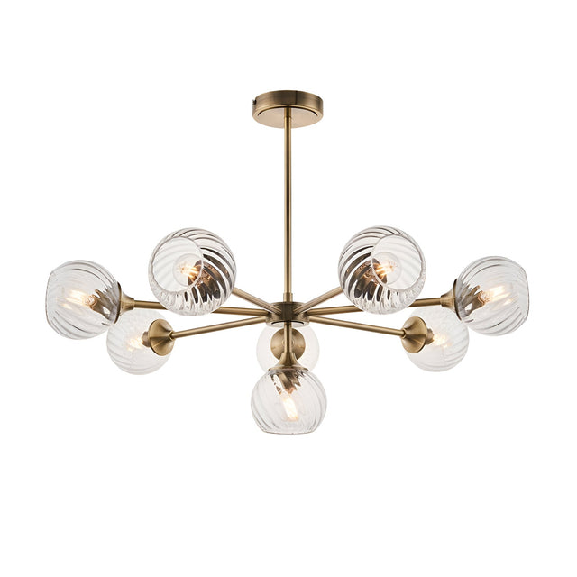 Endon Georgiana 8 light semi-flush pendant with spiral-cut clear glass globe shades on an antique brass frame, shown against a white background.