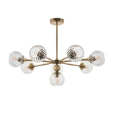 Endon Georgiana 8 light semi-flush pendant with spiral-cut clear glass globe shades on a brass sputnik-style frame, shown on a white background.