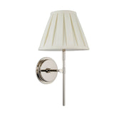 Endon Chartwell wall light with a tapered cream box-pleat cotton shade on a polished nickel bracket and round backplate, shown on a white background.