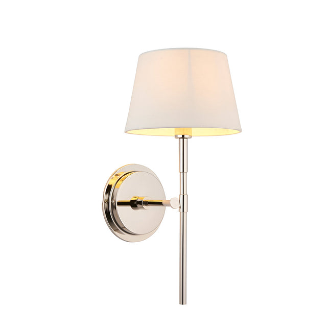 Endon Chartwell wall light with a tapered ivory fabric shade and slim polished nickel bracket with round wall plate, shown on a white background.