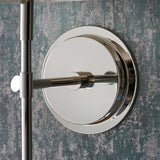 Close-up of Endon Chartwell wall light backplate and slim arm in polished nickel, mounted on a textured teal wall.
