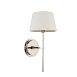 Endon Chartwell wall light with a tapered ivory fabric shade and slim nickel stem on a round backplate, shown against a plain white background.