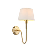 Endon Cliffdon single wall light in antique brass with a curved arm and tapered ivory fabric shade, shown on a plain white background.