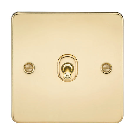 The 10AX 1 Gang 2-Way Toggle Switch in polished brass features a square, ultra-low profile design with a central toggle and two visible screws. This flat plate switch is minimal and elegant, showcasing a smooth, reflective surface.