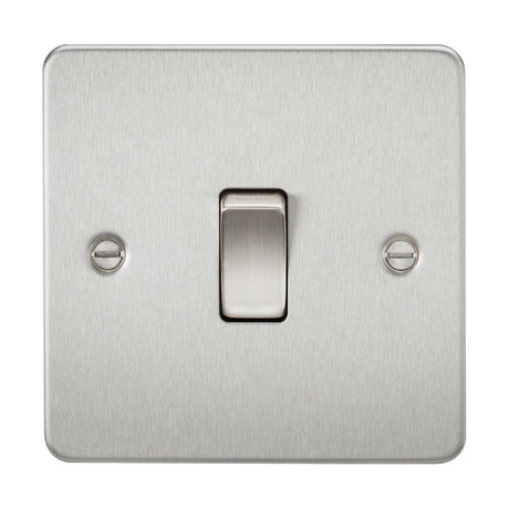 The 10AX 1 Gang 2-Way Switch boasts a brushed chrome finish with a sleek and modern look. It features a metallic switch centered on the flat plate, secured by two screws on either side.