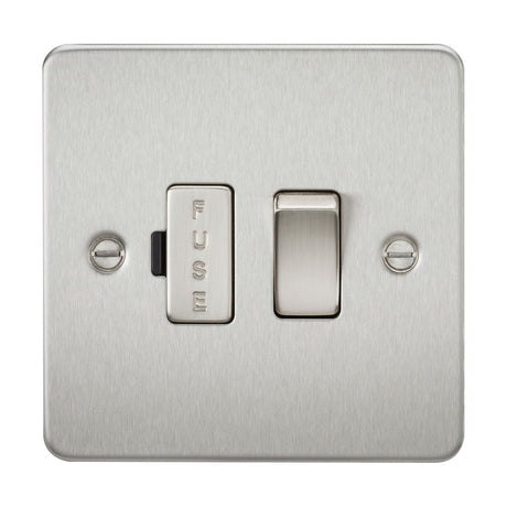 The 13A Switched Fused Spur Unit in brushed chrome features a flat plate design with a single toggle switch positioned on the right side and a fused spur holder labeled "FUSE" on the left. It includes two visible screw holes, one on each side, for a sleek and functional finish.