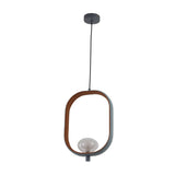 The Strappa Pendant Light - Grey/Black features a modern LED design with an oval wood and metal frame, inspired by Chinese lanterns, hanging from a black cord. The bulb sits at the bottom inside the open frame.