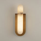 Luneth LED Large Alabaster Wall Light in brushed brass, with a vertical alabaster rod glowing warm white within a U-shaped brass backplate, shown on a plain grey background.