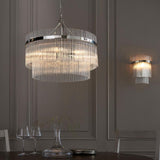 Endon Beaumont nickel wall light with clear glass rods and E14 bulb, shown beside a tiered glass rod chandelier in a panelled dining room.