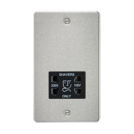 Introducing the 115/Dual Voltage Shaver Socket in Brushed Chrome with a Black Insert and Flat Plate design. This sleek, wall-mounted socket features two plug slots labeled 230V and 115V, with an elegant metal plate inscribed "SHAVERS ONLY.